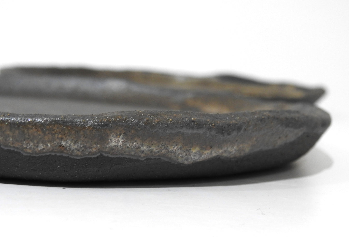 Black handmade ceramic dinnerware wabi sabi pottery 

Unique handcrafted ceramic plates earthy black brown beige design