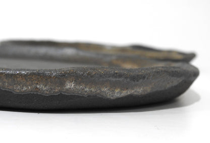 Black handmade ceramic dinnerware wabi sabi pottery 

Unique handcrafted ceramic plates earthy black brown beige design