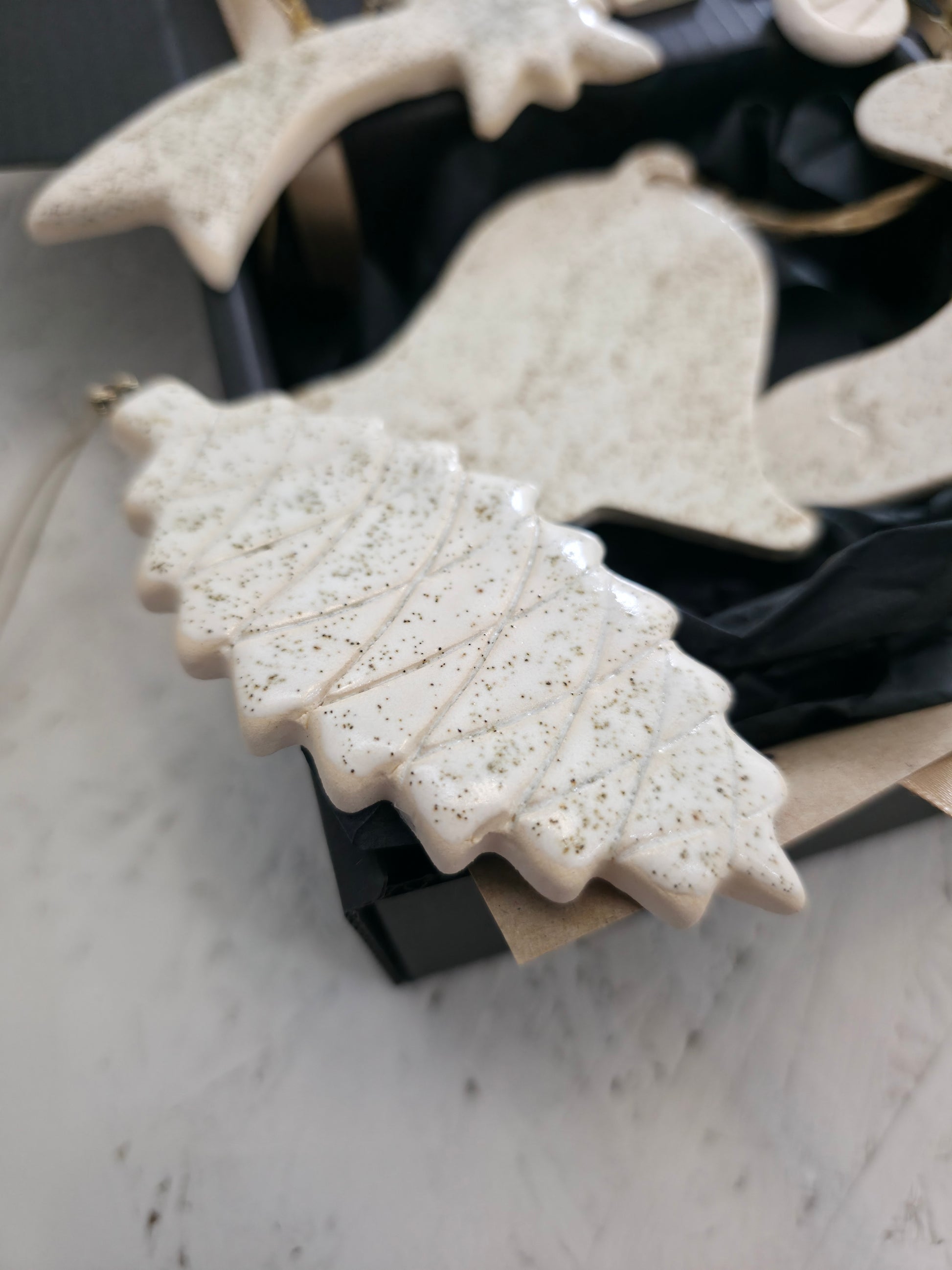 Handcrafted White Ceramic Holiday Ornaments – Modern & Minimal
