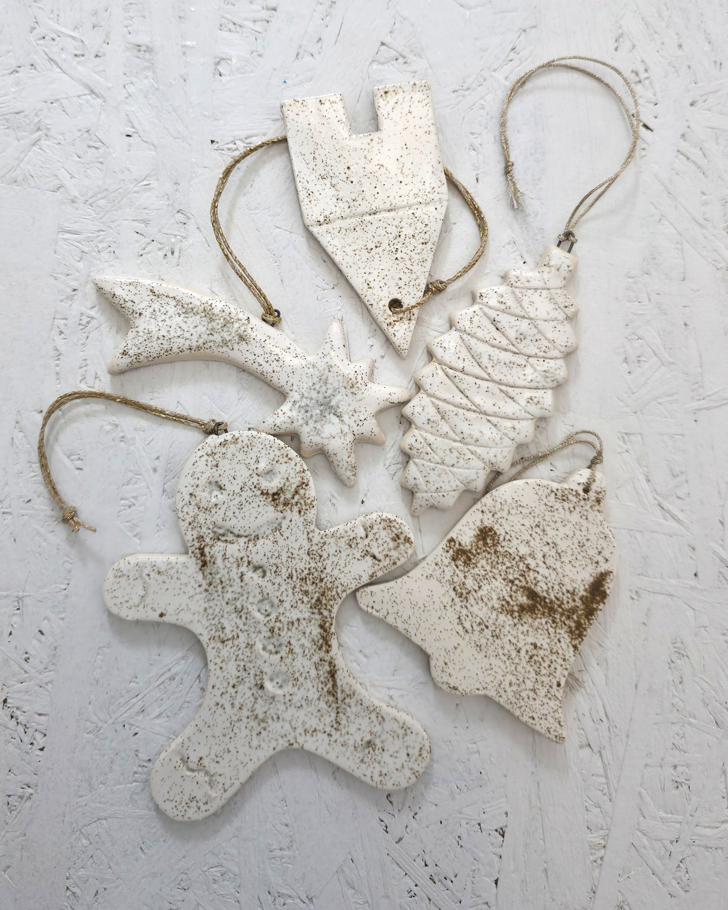 Discover a refined selection of five handcrafted ceramic ornaments, elegantly presented in a luxury gift box designed for thoughtful, meaningful gifting. Each piece is made by hand in our studio, using smooth white clay and subtle beige-white glazes, creating a timeless, minimal aesthetic.