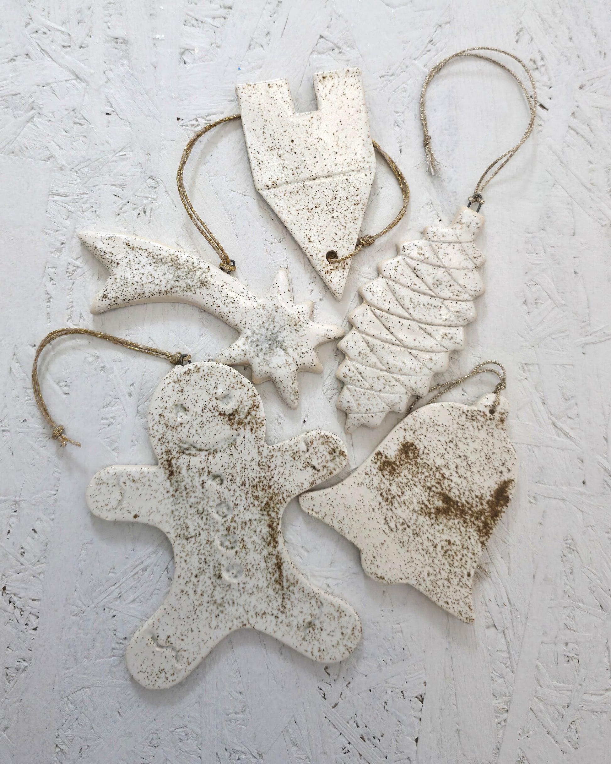 Discover a refined selection of five handcrafted ceramic ornaments, elegantly presented in a luxury gift box designed for thoughtful, meaningful gifting. Each piece is made by hand in our studio, using smooth white clay and subtle beige-white glazes, creating a timeless, minimal aesthetic.