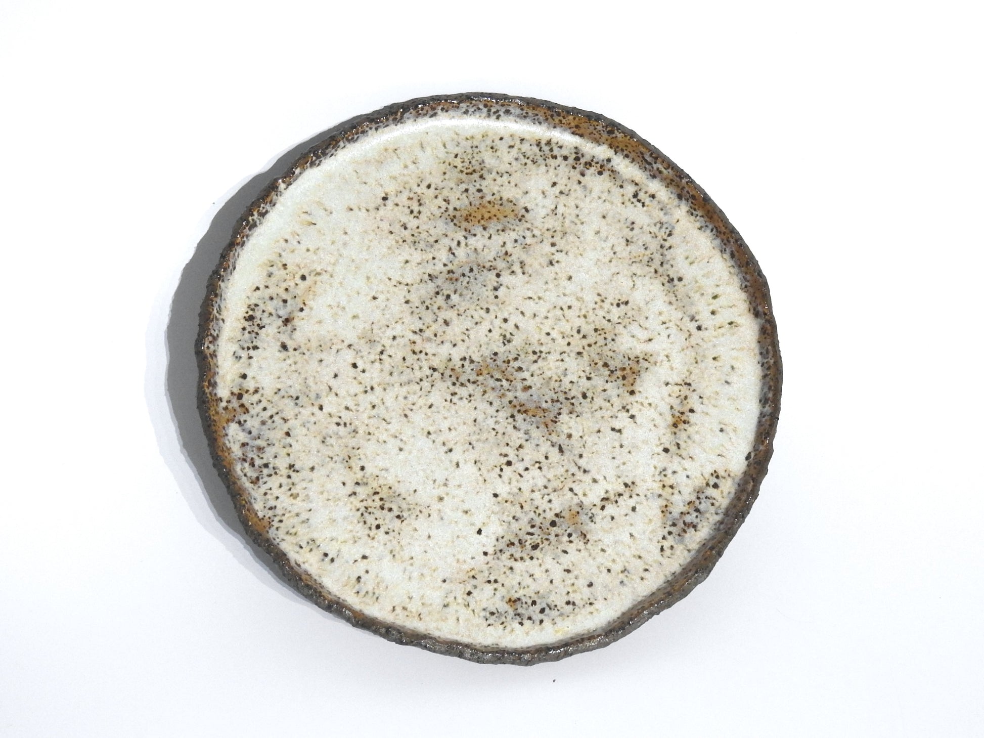 Handmade ceramic dinner plate set rustic stoneware tableware

Artisan ceramic serving plates handmade dinnerware earthy glaze

Rustic handmade ceramic plates set for dining and serving

Unique handcrafted stoneware dinner plates speckled ceramic design

Handmade ceramic tableware rustic dinner plates organic finish