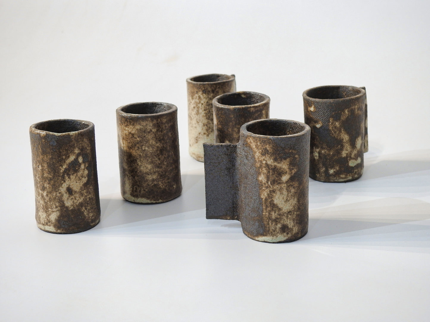 handmade esspresso cup raw aesthetics wabi sabi pottery brown minimal design pottery Rustic wabi sabi ceramic espresso cups in black, brown and beige tones

Handmade wabi sabi espresso cups organic ceramic tableware

Artisan rustic stoneware espresso cups minimalist Japanese wabi sabi style

Unique handcrafted espresso cups earthy black brown beige design

Wabi sabi aesthetic ceramic espresso cups rustic handmade tableware