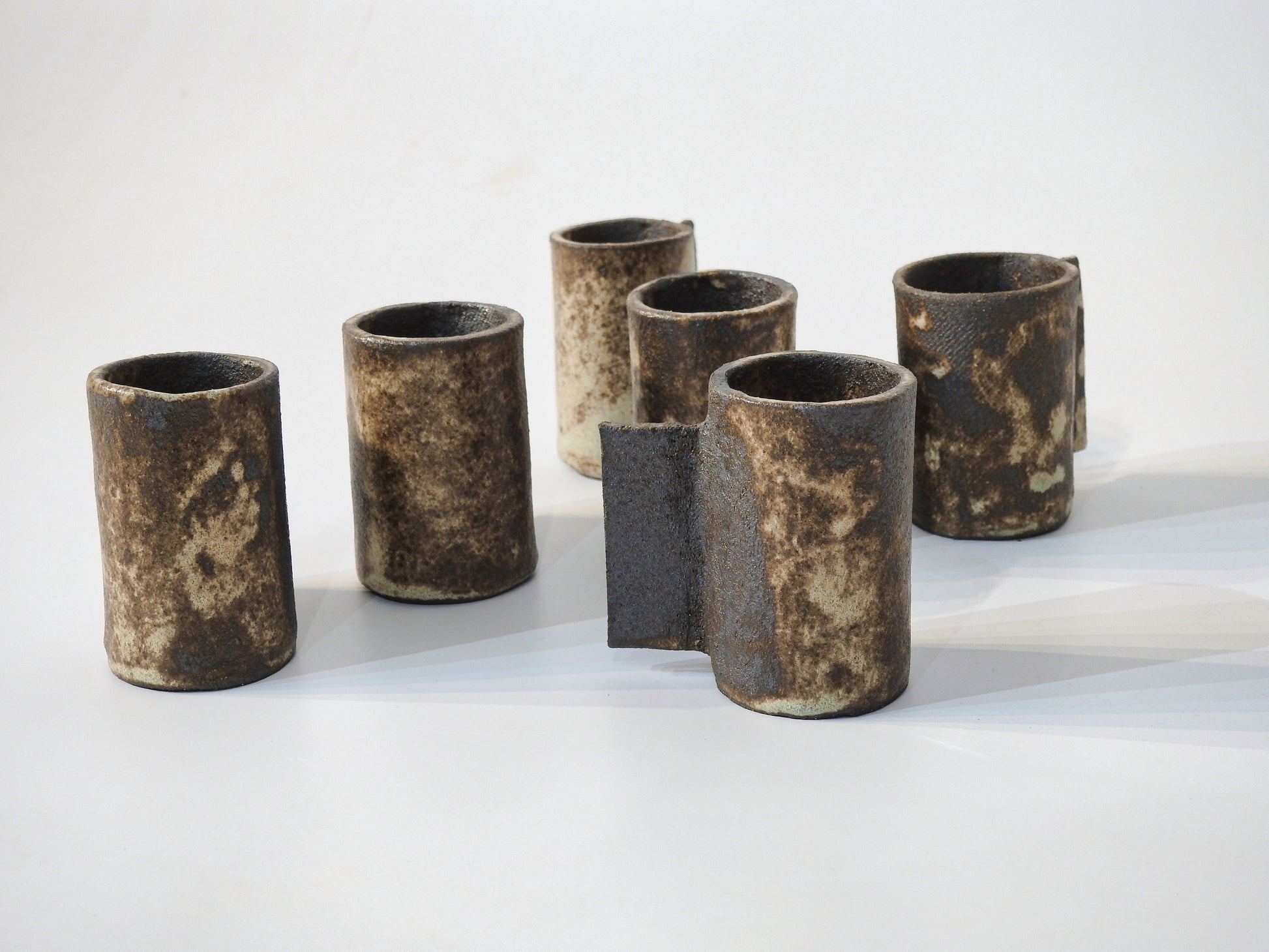 handmade esspresso cup raw aesthetics wabi sabi pottery brown minimal design pottery Rustic wabi sabi ceramic espresso cups in black, brown and beige tones

Handmade wabi sabi espresso cups organic ceramic tableware

Artisan rustic stoneware espresso cups minimalist Japanese wabi sabi style

Unique handcrafted espresso cups earthy black brown beige design

Wabi sabi aesthetic ceramic espresso cups rustic handmade tableware
